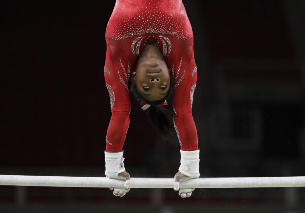 United States' Simone Biles trains on the uneven bars ahead of the 2016 Summer Olympics in Rio de Janeiro, Brazil, Thursday, Aug. 4, 2016. (AP Photo/Rebecca Blackwell)